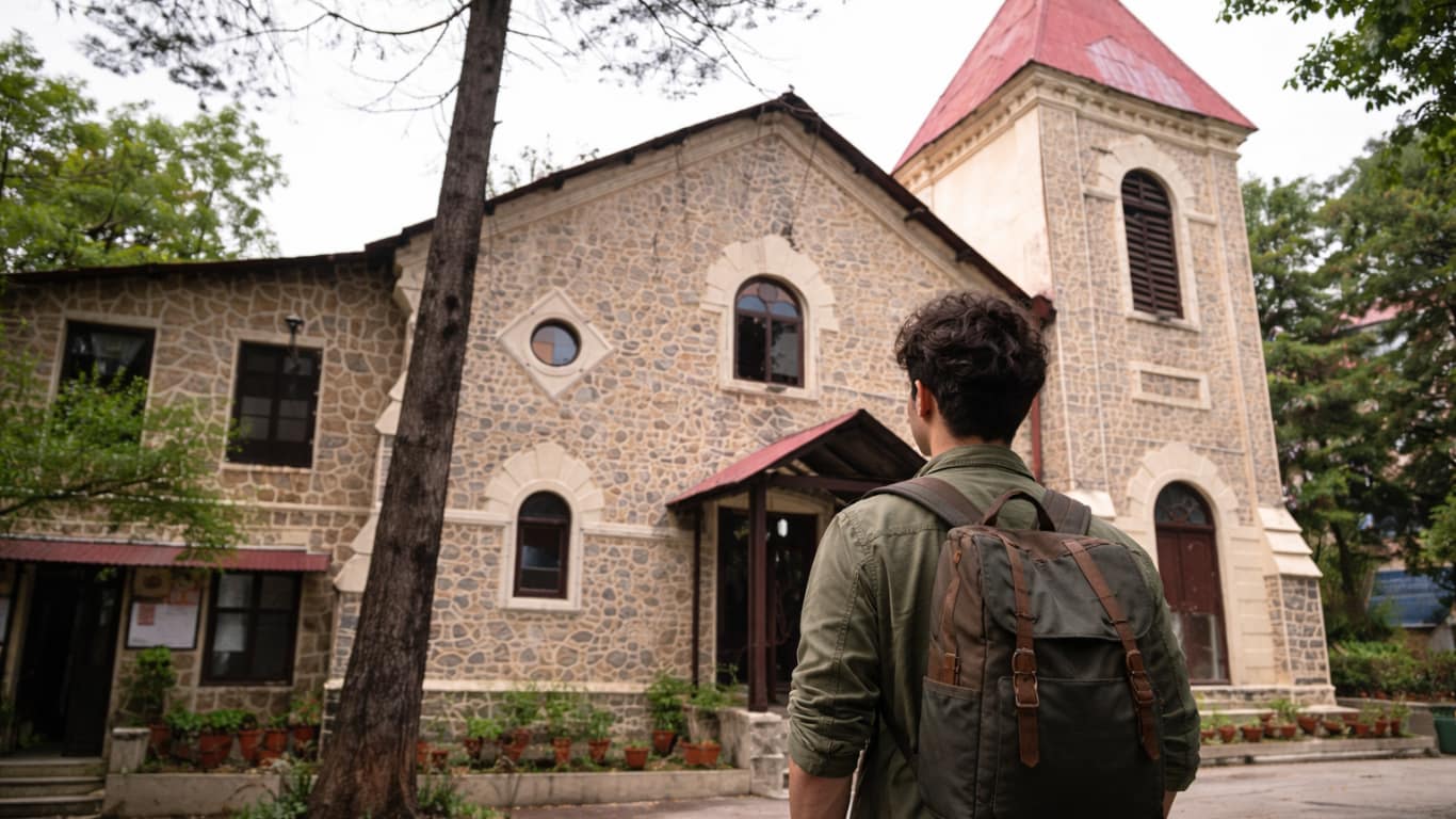 Traveler exploring a church in Mussoorie