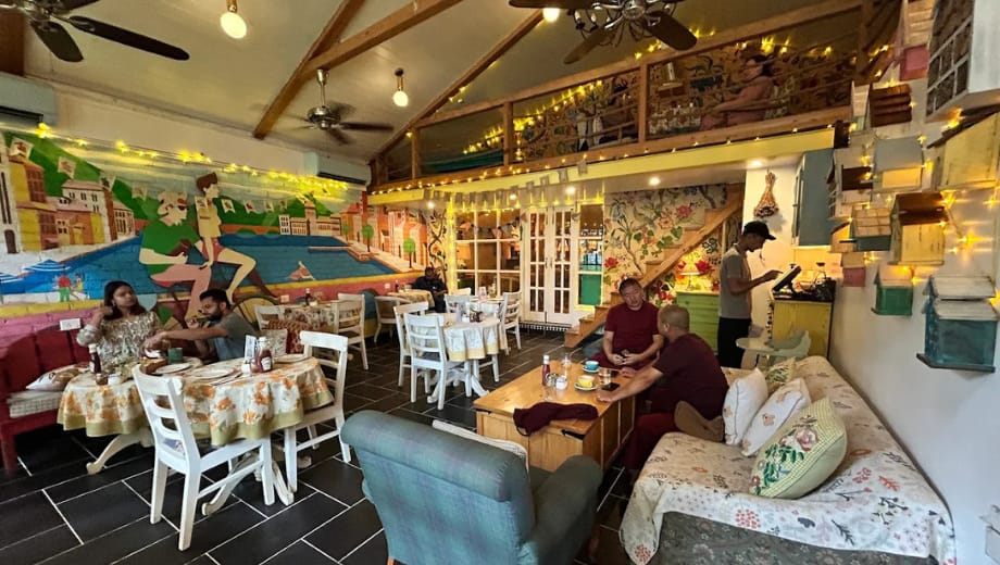 Café de Piccolo Rajpur Road rustic European café interior